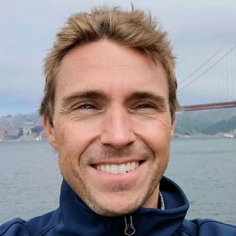 Carlos Sánchez Cazorla, smiling, with the Golden Gate Bridge behind him